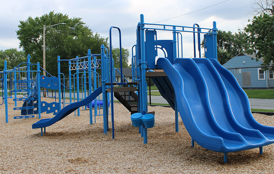 Aquinas playground system funded by Big Shoulders